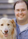 Photo of a man with his dog