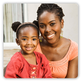 Photo of woman holding daughter